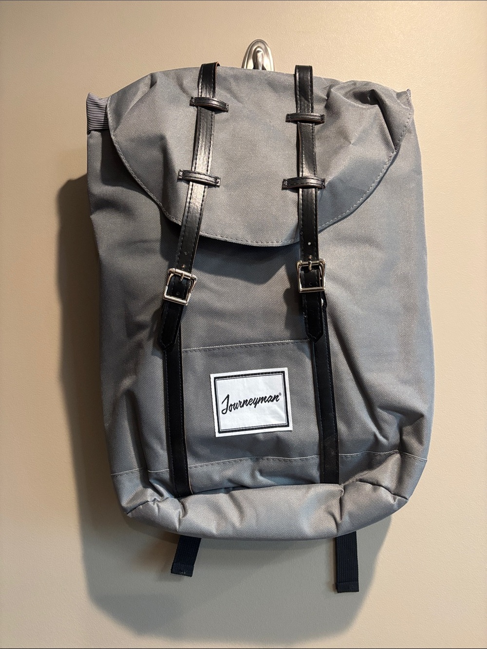 Gray Canvas Backpack with Black Straps